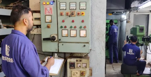 An engineer recording readings at the pump test panel